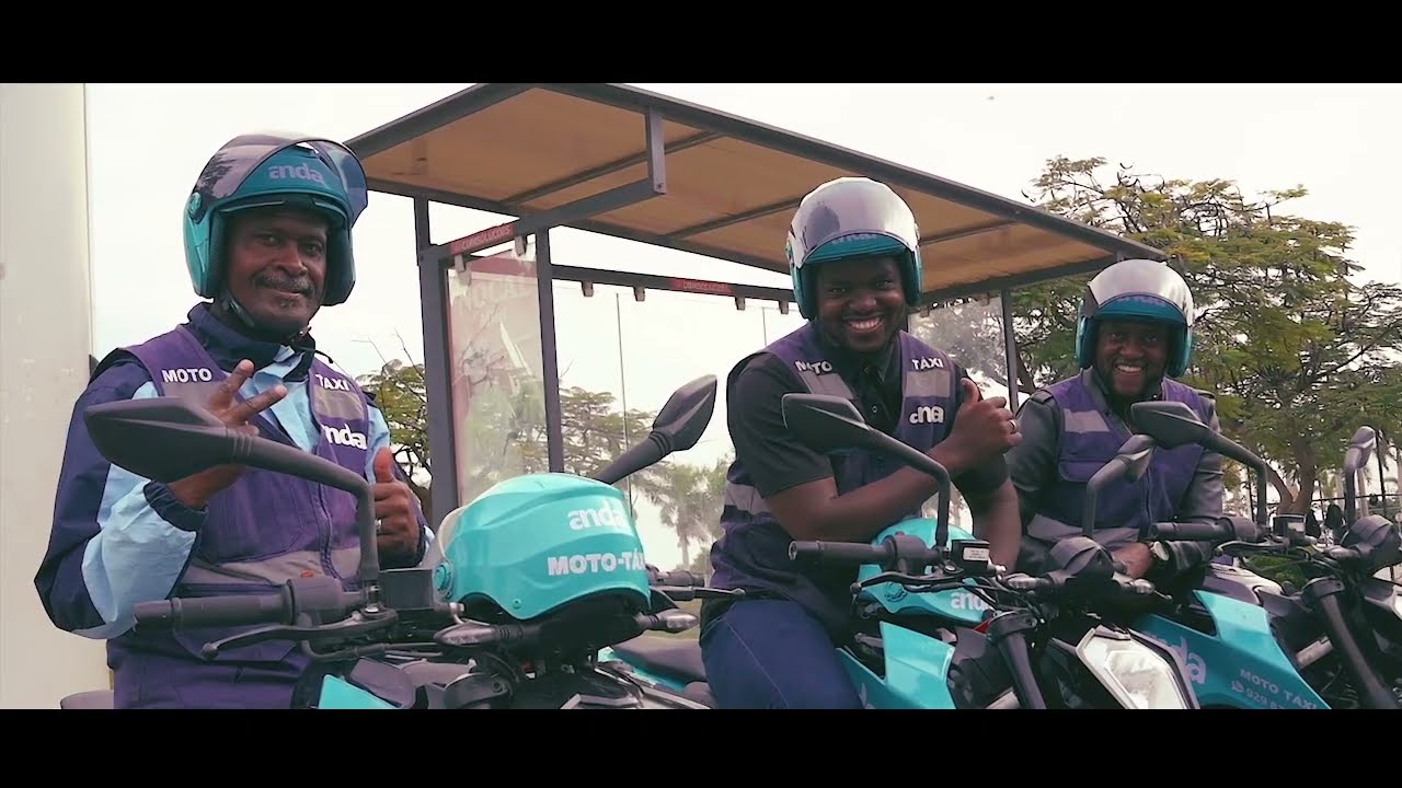 An ANDA motorcycle-taxi driver on the road in Luanda, Angola